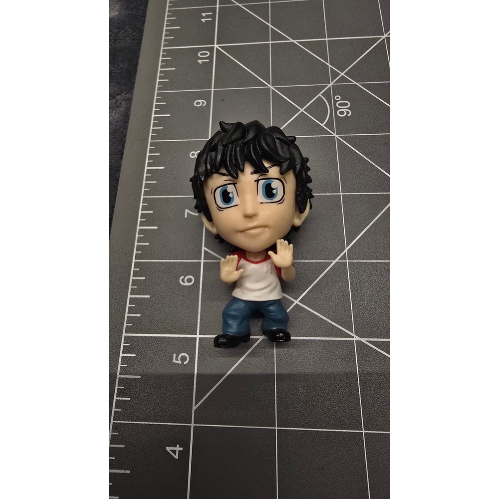 Mini-figure of Takemichi Hanagaki from the popular anime series Tokyo Revengers